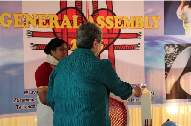 S. Mary Diez, President, lights the 2018 General Assembly candle
