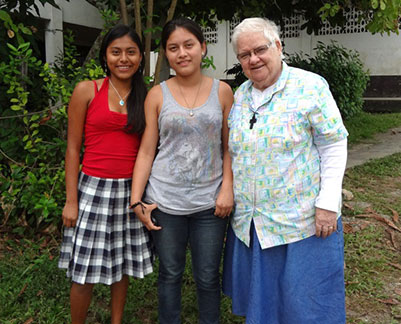 Sister Jo with scholarship recipients