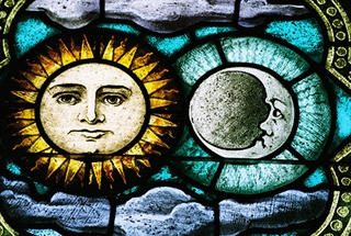 Chapel window depicting brother sun and sister moon