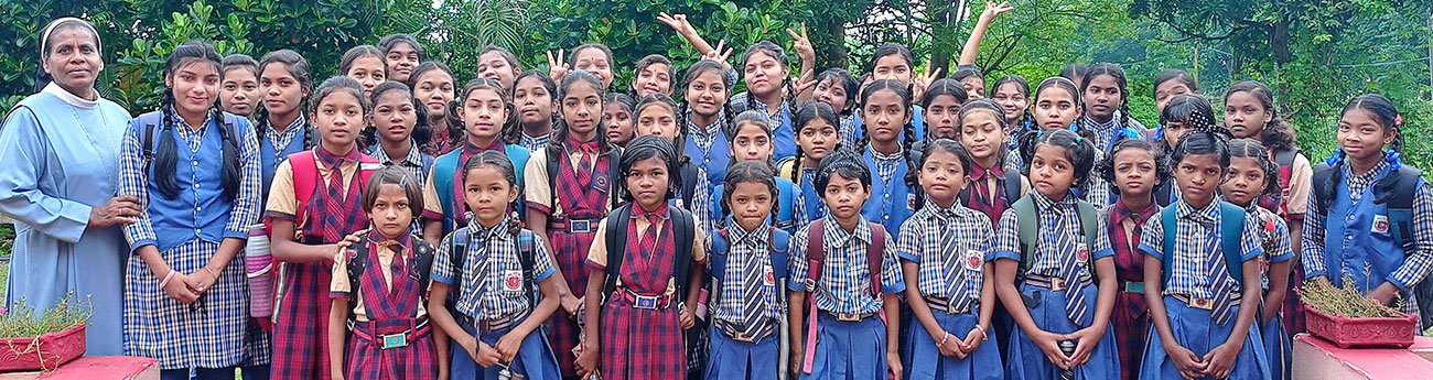 Students and teacher at Maria Sadan Boarding School in India