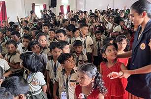 Teacher with children at a school in North India